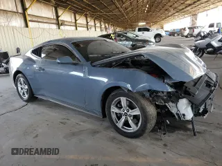2024 Ford Mustang EcoBoost with VIN 1FA6P8TH8R5122598, listed as a Copart auction lot 58627015 with 15,557 mi miles and Salvage title. Bid and sale history available at DreamBid. Image 4.