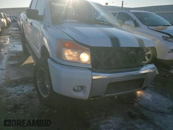 2012 Nissan Titan SV with VIN 1N6AA0EC1CN326088, listed as a Copart auction lot 42799335 with 163,218 mi miles and Salvage Title. Bid and sale history available at carsss.com. Image 10.