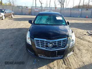 2013 Cadillac XTS z VIN 2G61N5S32D9238652, wystawiony jako IAAI lot #40966692 z przebiegiem 90 834 mil mil oraz . Historia ofert i sprzedaży dostępna na DreamBid. Obrazek 12.