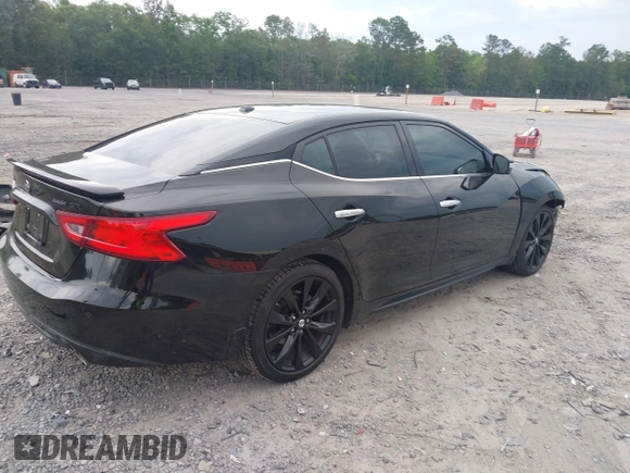 2018 Nissan Maxima Platinum z VIN 1N4AA6AP9JC392479, wystawiony jako IAAI lot #42209148 z przebiegiem 103 710 mil mil oraz . Historia ofert i sprzedaży dostępna na DreamBid. Obrazek 4.