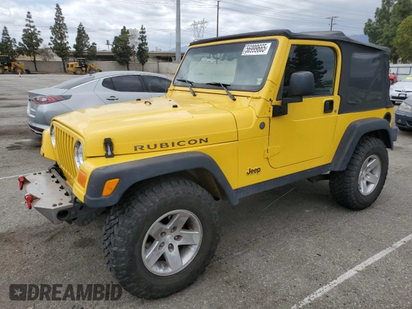 2004 Jeep Wrangler Rubicon with VIN 1J4FA69SX4P768963, listed as a Copart auction lot 56999665 with 91,949 mi miles and Salvage title. Bid and sale history available at DreamBid. Image 1.