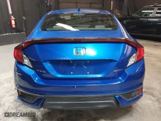 2016 Honda Civic Coupe Touring with VIN 2HGFC3B95GH350813, listed as a IAAI auction lot 41531873 with 99,409 mi miles. Bid and sale history available at carsss.com. Image 16.