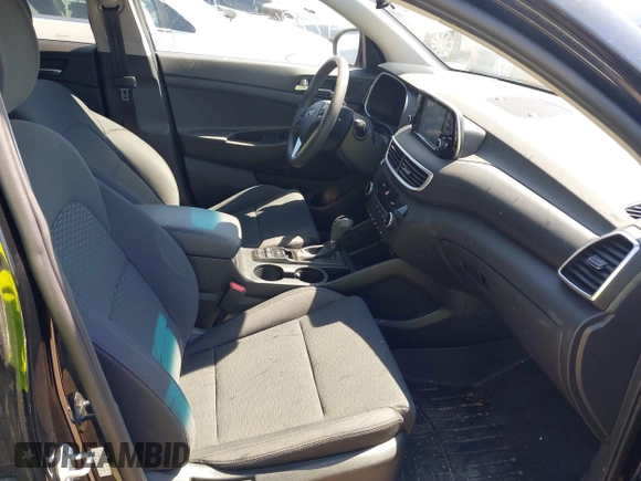 2019 Hyundai Tucson Value with VIN KM8J3CA46KU935335, listed as a IAAI auction lot 42296162 with 65,099 mi miles and . Bid and sale history available at DreamBid. Image 5.