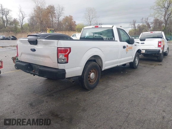 2018 Ford F-150 XL with VIN 1FTMF1CBXJKE56080, listed as a IAAI auction lot 41958854 with 140,646 mi miles. Bid and sale history available at carsss.com. Image 4.