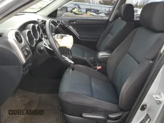 2008 Toyota Matrix STD with VIN 2T1KR32E28C700516, listed as a Copart auction lot 52072585 with 228,761 mi miles and Salvage Title. Bid and sale history available at DreamBid. Image 7.