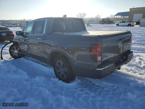 2020 Honda Ridgeline RTL-E with VIN 5FPYK3F74LB002141, listed as a Copart auction lot 87534955 with 139,030 mi miles and Salvage Title. Bid and sale history available at carsss.com. Image 2.