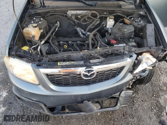 2011 Mazda Tribute Touring with VIN 4F2CY0C79BKM02153, listed as a Copart auction lot 78006704 with 172,884 mi miles and Non Repairable. Bid and sale history available at carsss.com. Image 12.
