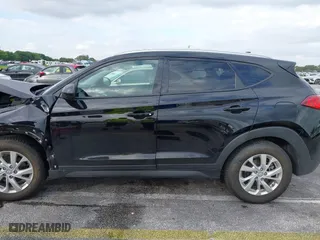 2019 Hyundai Tucson Value with VIN KM8J33A40KU068014, listed as a IAAI auction lot 40877057 with 34,966 mi miles. Bid and sale history available at carsss.com. Image 14.