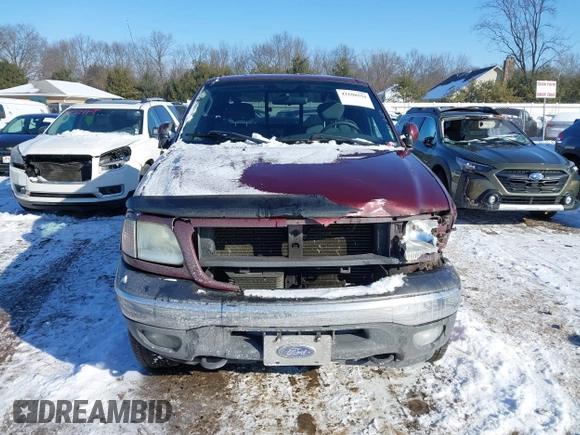 2003 Ford F-150 XL with VIN 1FTRX18L33NB00026, listed as a IAAI auction lot 41608554 with 161,877 mi miles. Bid and sale history available at carsss.com. Image 12.