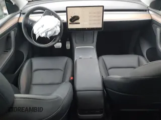 2023 Tesla Model Y Performance with VIN 7SAYGDEF3PF847225, listed as a Copart auction lot 52171135 with 29,724 mi miles and Salvage Title. Bid and sale history available at DreamBid. Image 8.