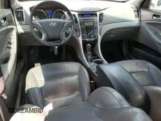 2012 Hyundai Sonata Hybrid z VIN KMHEC4A43CA059186, wystawiony jako Copart lot #55575405 z przebiegiem 217 801 mil mil oraz Szkoda całkowita • Salvage title. Historia ofert i sprzedaży dostępna na DreamBid. Obrazek 8.