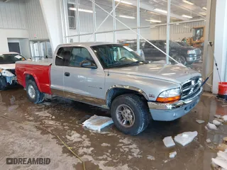 1998 Dodge Dakota SLT with VIN 1B7GL22YXWS762222, listed as a IAAI auction lot 41250956 with 195,027 mi miles. Bid and sale history available at carsss.com. Image 1.