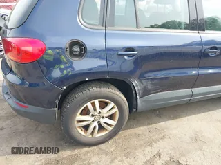 2015 Volkswagen Tiguan S z VIN WVGBV7AX8FW503114, wystawiony jako IAAI lot #42397033 z przebiegiem 200 658 mil mil oraz . Historia ofert i sprzedaży dostępna na DreamBid. Obrazek 6.