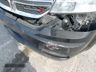 2013 Dodge Journey SE with VIN 3C4PDCAB0DT710609, listed as a IAAI auction lot 41763431 with 145,851 mi miles and . Bid and sale history available at DreamBid. Image 15.