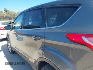 2014 Ford Escape SE with VIN 1FMCU9G99EUB13371, listed as a IAAI auction lot 42167417 with 140,145 mi miles and . Bid and sale history available at DreamBid. Image 19.