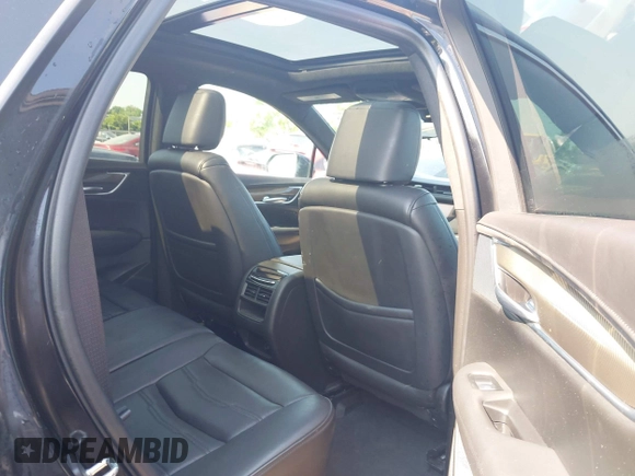 2017 Cadillac XT5 Platinum AWD with VIN 1GYKNFRS6HZ130626, listed as a IAAI auction lot 42470536 with 128,129 mi miles and . Bid and sale history available at DreamBid. Image 8.
