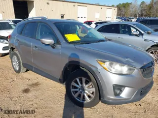 2014 Mazda CX-5 Touring with VIN JM3KE2CY2E0423376, listed as a IAAI auction lot 41650933 with 113,352 mi miles. Bid and sale history available at carsss.com. Image 1.