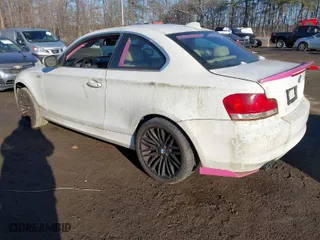 2011 BMW 1 Series 128i with VIN WBAUP7C59BVK78590, listed as a IAAI auction lot 41349575 with 119,438 mi miles. Bid and sale history available at carsss.com. Image 3.
