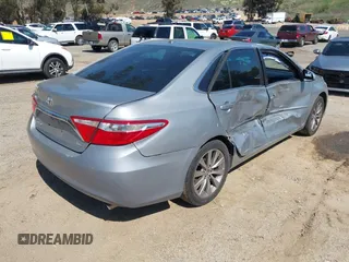 2015 Toyota Camry XLE with VIN 4T1BF1FK6FU882262, listed as a IAAI auction lot 41819208 with 123,173 mi miles and . Bid and sale history available at DreamBid. Image 4.