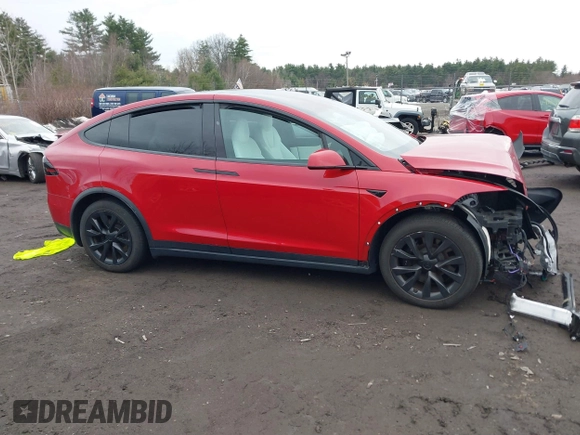 2022 Tesla Model X with VIN 7SAXCBE57NF354843, listed as a IAAI auction lot 41027188 with Not Provided miles and . Bid and sale history available at DreamBid. Image 13.