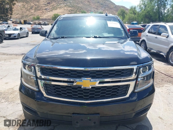 2018 Chevrolet Tahoe LS with VIN 1GNSCAKC9JR183853, listed as a IAAI auction lot 42254267 with 87,351 mi miles and . Bid and sale history available at DreamBid. Image 12.