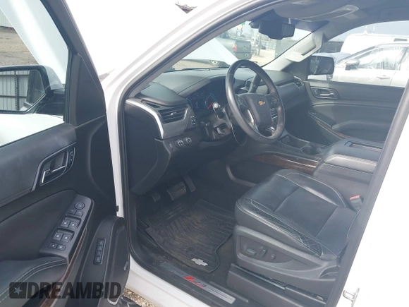 2017 Chevrolet Tahoe LT with VIN 1GNSKBKCXHR350028, listed as a IAAI auction lot 41684954 with 117,261 mi miles and . Bid and sale history available at DreamBid. Image 20.