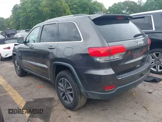 2019 Jeep Grand Cherokee Altitude with VIN 1C4RJEAG7KC556191, listed as a IAAI auction lot 42160524 with 96,373 mi miles and . Bid and sale history available at DreamBid. Image 3.