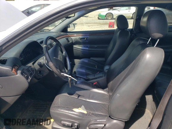 2001 Toyota Solara SE z VIN 2T1CF28P71C542504, wystawiony jako Copart lot #54675935 z przebiegiem 181 793 mil mil oraz Szkoda całkowita • Salvage title. Historia ofert i sprzedaży dostępna na DreamBid. Obrazek 7.