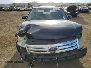 2009 Ford Taurus SE with VIN 1FAHP23W19G120846, listed as a Copart auction lot 75844274 with 159,907 mi miles and Salvage Title. Bid and sale history available at carsss.com. Image 5.