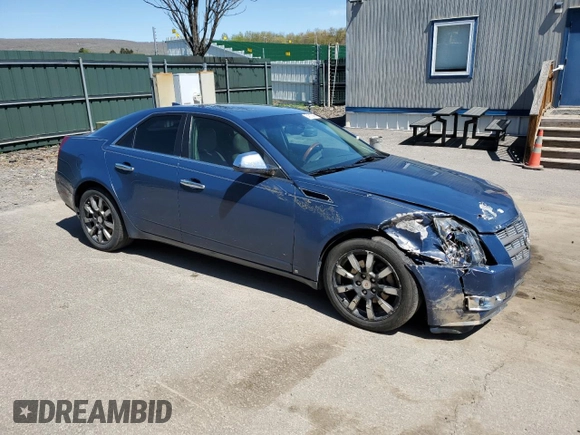 2009 Cadillac CTS AWD with VIN 1G6DH577390123365, listed as a Copart auction lot 54815885 with 141,026 mi miles and Salvage Title. Bid and sale history available at DreamBid. Image 4.