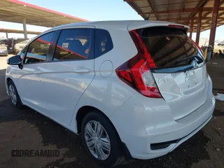 2020 Honda Fit LX z VIN 3HGGK5H45LM717560, wystawiony jako IAAI lot #41679343 z przebiegiem 47 134 mil mil oraz . Historia ofert i sprzedaży dostępna na DreamBid. Obrazek 3.