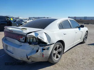 2014 Dodge Charger SXT with VIN 2C3CDXHG2EH104640, listed as a IAAI auction lot 41379760 with 122,664 mi miles and . Bid and sale history available at DreamBid. Image 4.