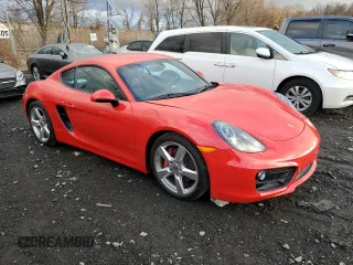 2015 Porsche Cayman S with VIN WP0AB2A80FK184769, listed as a Copart auction lot 83772914 with Not Provided miles and Salvage Title. Bid and sale history available at DreamBid. Image 4.