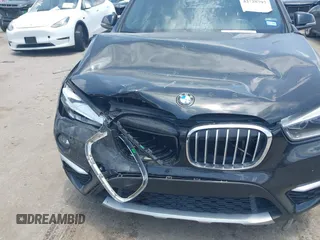 2017 BMW X1 xDrive28i with VIN WBXHT3Z30H4A65417, listed as a IAAI auction lot 42328797 with 103,788 mi miles and . Bid and sale history available at DreamBid. Image 6.