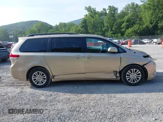 2011 Toyota Sienna XLE AAS with VIN 5TDYK3DC7BS008535, listed as a IAAI auction lot 42589645 with 208,624 mi miles and . Bid and sale history available at DreamBid. Image 13.