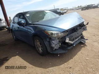 2014 Mazda 3 i Touring with VIN JM1BM1L71E1151538, listed as a IAAI auction lot 42148640 with 136,564 mi miles and . Bid and sale history available at DreamBid. Image 1.