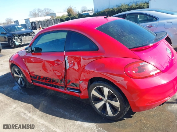 2012 Volkswagen Beetle 2.0T Turbo w/Sun/Sound with VIN 3VWV67ATXCM650376, listed as a IAAI auction lot 41315431 with 104,523 mi miles. Bid and sale history available at carsss.com. Image 14.
