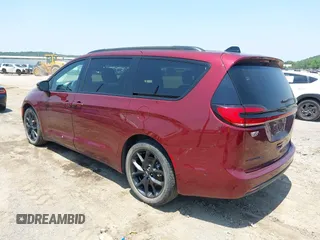 2023 Chrysler Pacifica Touring L with VIN 2C4RC1BG7PR513017, listed as a IAAI auction lot 42441272 with 23,310 mi miles and . Bid and sale history available at DreamBid. Image 3.