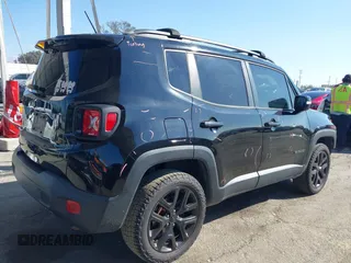 2017 Jeep Renegade Latitude with VIN ZACCJBBBXHPG58497, listed as a IAAI auction lot 41550493 with 137,360 mi miles. Bid and sale history available at carsss.com. Image 4.