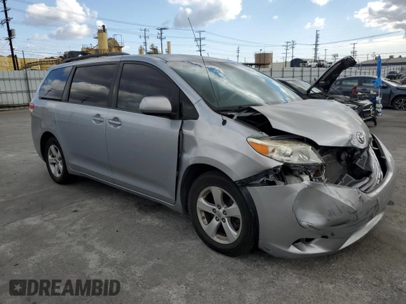 2014 Toyota Sienna LE AAS with VIN 5TDKK3DC7ES492300, listed as a Copart auction lot 53553955 with 153,495 mi miles and Salvage Title. Bid and sale history available at carsss.com. Image 4.