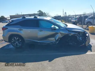 2018 Lexus RX 350 z VIN 2T2BZMCA7JC140852, wystawiony jako IAAI lot #41669823 z przebiegiem 56 306 mil mil oraz . Historia ofert i sprzedaży dostępna na DreamBid. Obrazek 13.