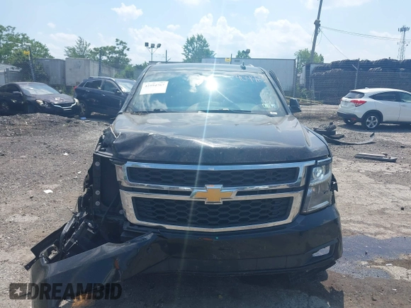2016 Chevrolet Tahoe LS z VIN 1GNSKAKC7GR409402, wystawiony jako IAAI lot #42594767 z przebiegiem 210 315 mil mil oraz . Historia ofert i sprzedaży dostępna na DreamBid. Obrazek 12.
