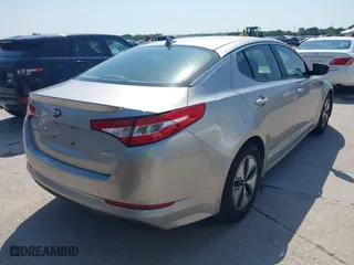2013 Kia Optima Hybrid EX with VIN KNAGM4AD8D5059623, listed as a IAAI auction lot 42052998 with 135,051 mi miles. Bid and sale history available at carsss.com. Image 4.