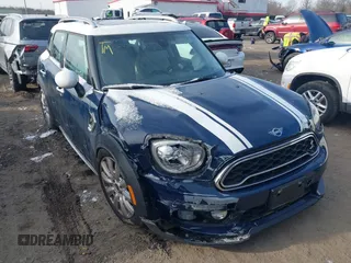 2019 MINI Countryman Cooper S with VIN WMZYT5C59K3E64522, listed as a IAAI auction lot 41386965 with 58,235 mi miles. Bid and sale history available at carsss.com. Image 1.