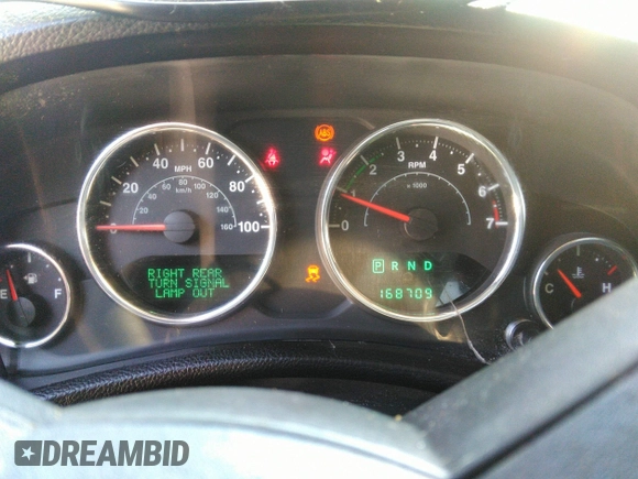 2013 Jeep Wrangler Unlimited Sport z VIN 1C4BJWDG1DL660844, wystawiony jako IAAI lot #42347284 z przebiegiem 168 709 mil mil oraz . Historia ofert i sprzedaży dostępna na DreamBid. Obrazek 7.