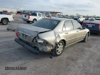 2002 Acura RL z VIN JH4KA96552C008589, wystawiony jako IAAI lot #41860930 z przebiegiem 210 847 mil mil oraz . Historia ofert i sprzedaży dostępna na DreamBid. Obrazek 4.