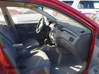 2002 Mitsubishi Lancer LS with VIN JA3AJ36E82U063279, listed as a IAAI auction lot 41711543 with 39,127 mi miles. Bid and sale history available at carsss.com. Image 5.