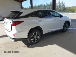 2021 Lexus RX with VIN JTJHZKFA2M2030841, listed as a IAAI auction lot 42009263 with 38,113 mi miles. Bid and sale history available at carsss.com. Image 4.