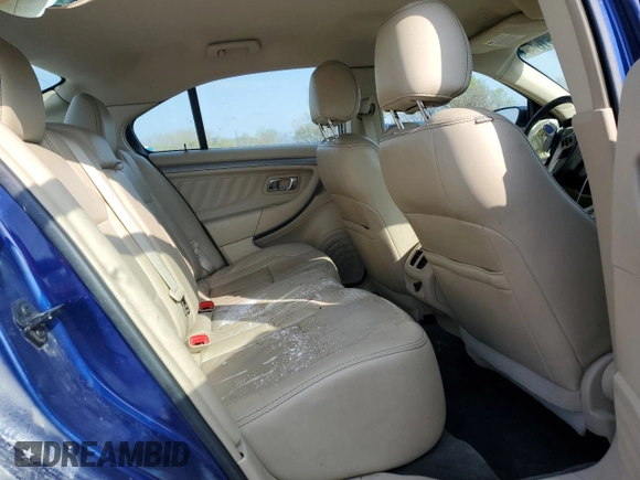 2014 Ford Taurus SEL z VIN 1FAHP2E88EG174797, wystawiony jako Copart lot #53961615 z przebiegiem Nie podano mil oraz Szkody całkowita. Historia ofert i sprzedaży dostępna na DreamBid. Obrazek 10.