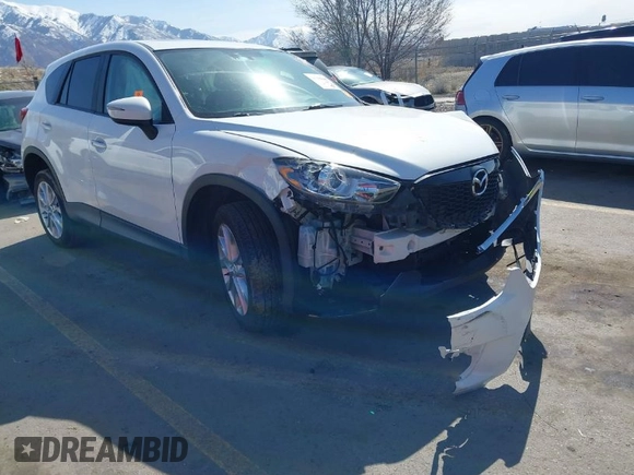 2015 Mazda CX-5 Grand Touring with VIN JM3KE4DY5F0526335, listed as a IAAI auction lot 41756046 with 1 mi miles. Bid and sale history available at carsss.com. Image 1.